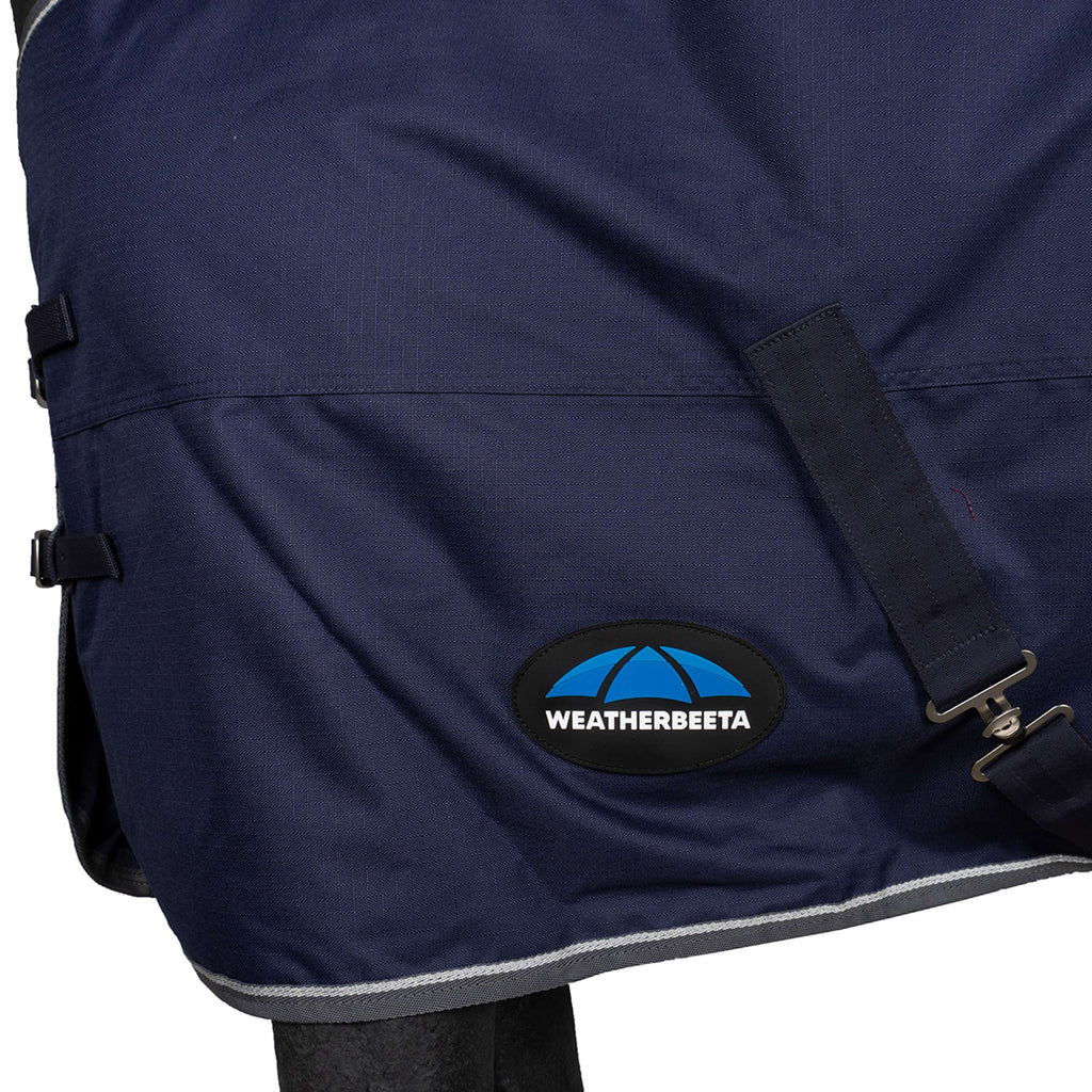 WeatherBeeta ComFiTec Tyro Turnout Standard Neck 50 g Blu marino/Carbone